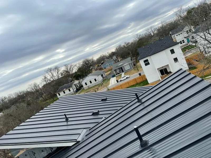 Standing seam metal roof panels with vents for Skylight Repair in Kennett Square